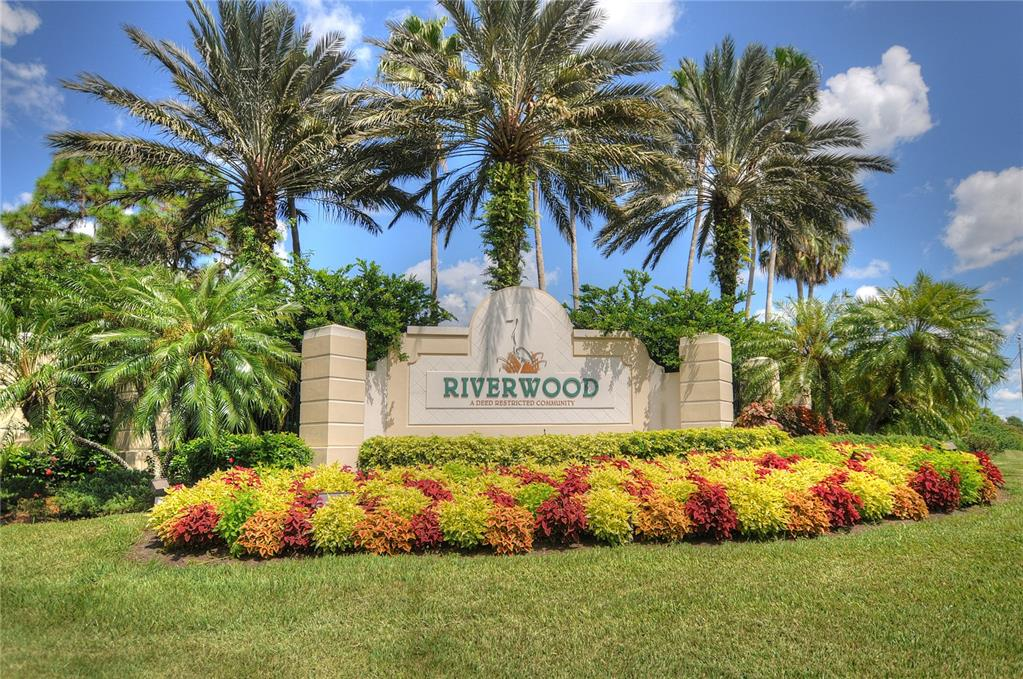 The landscaped Riverwood community entrance in Port Charlotte, Florida